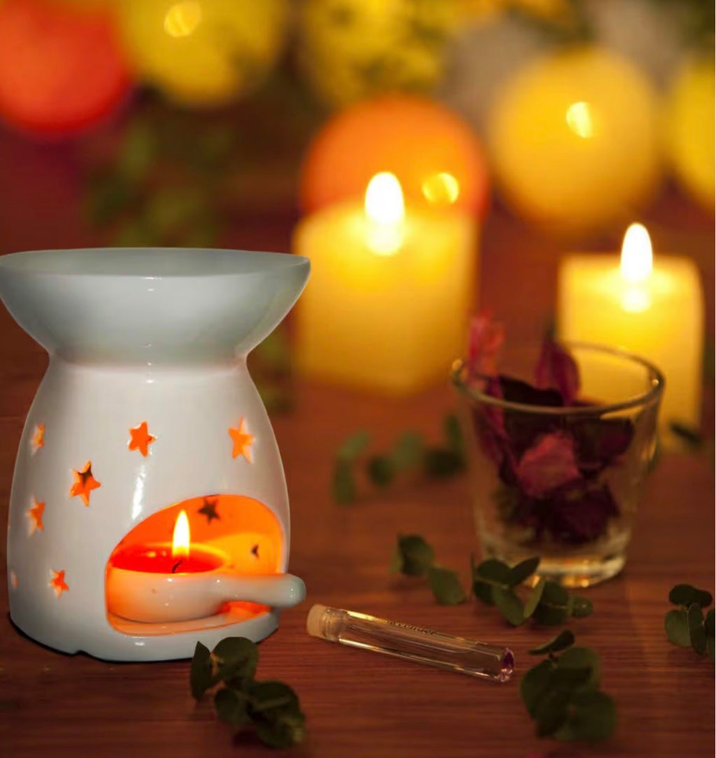 Star oil/ wax burner ( comes with spoon)